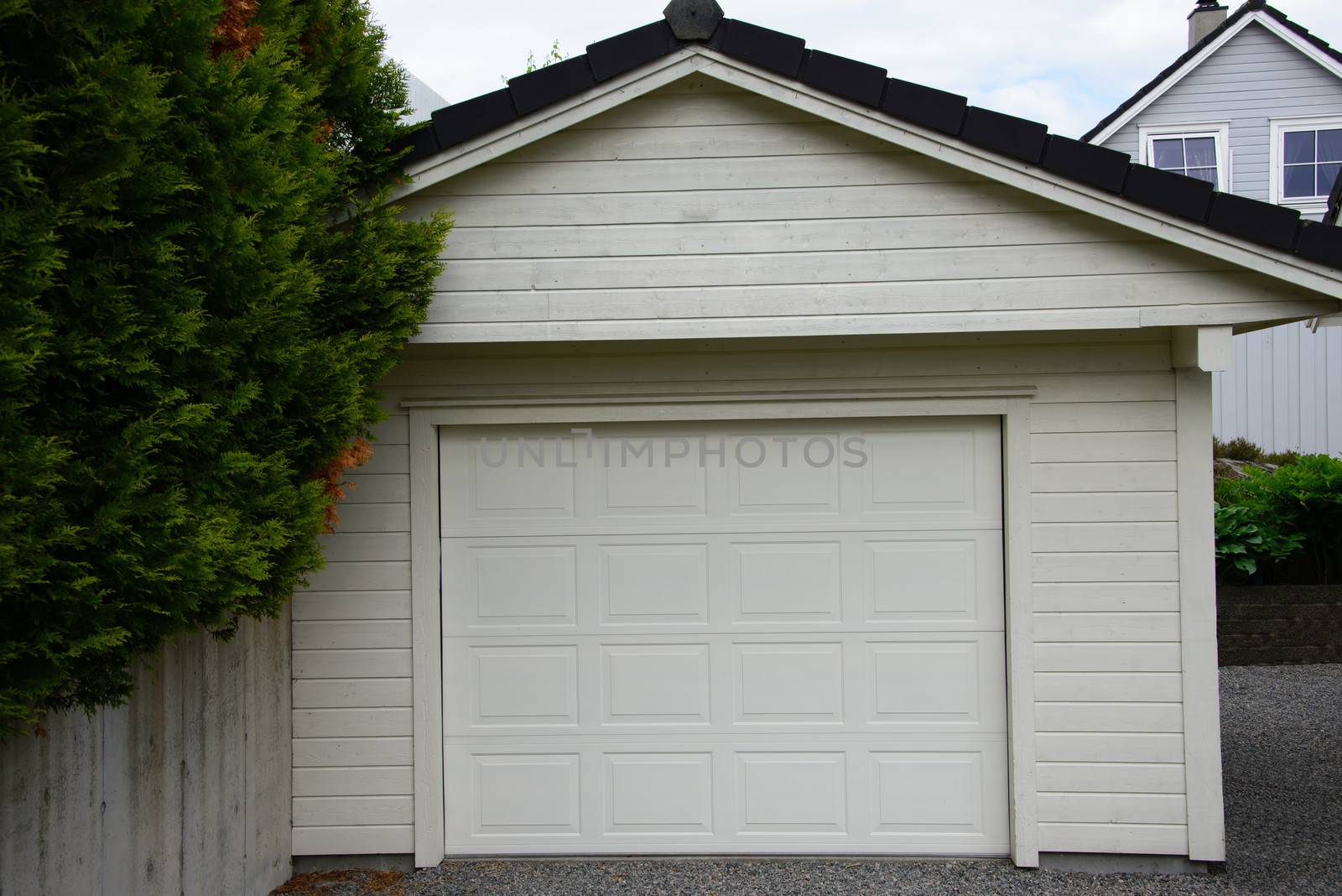 A white wooden garage