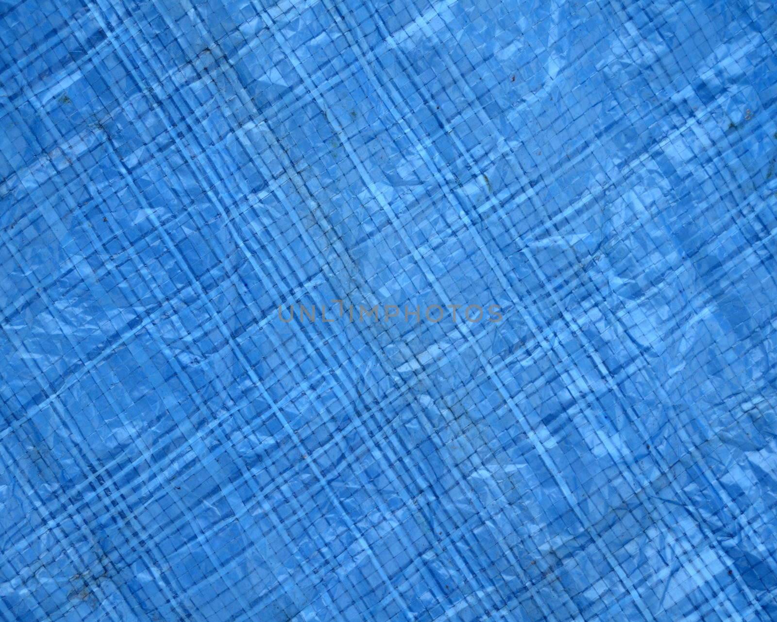 Abstract Background Texture Of Blue Woven Plastic Material