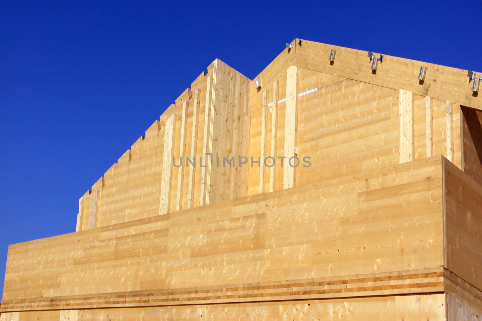 Natural wood construction of a house or a trade for a green energy isolation