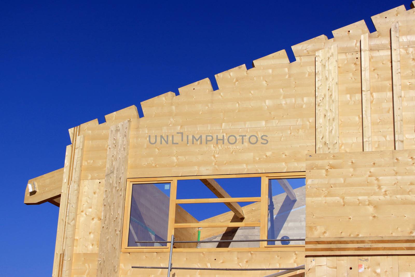 Natural wood construction of a house or a trade for a green energy isolation