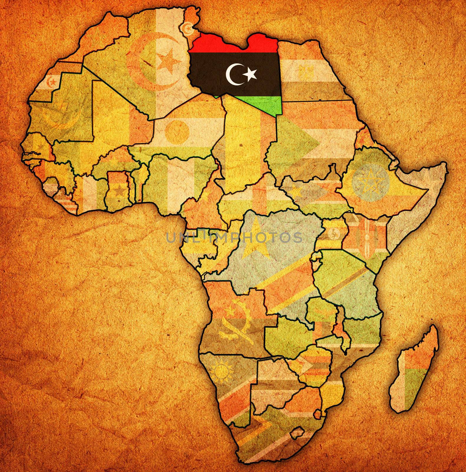 libya on actual vintage political map of africa with flags