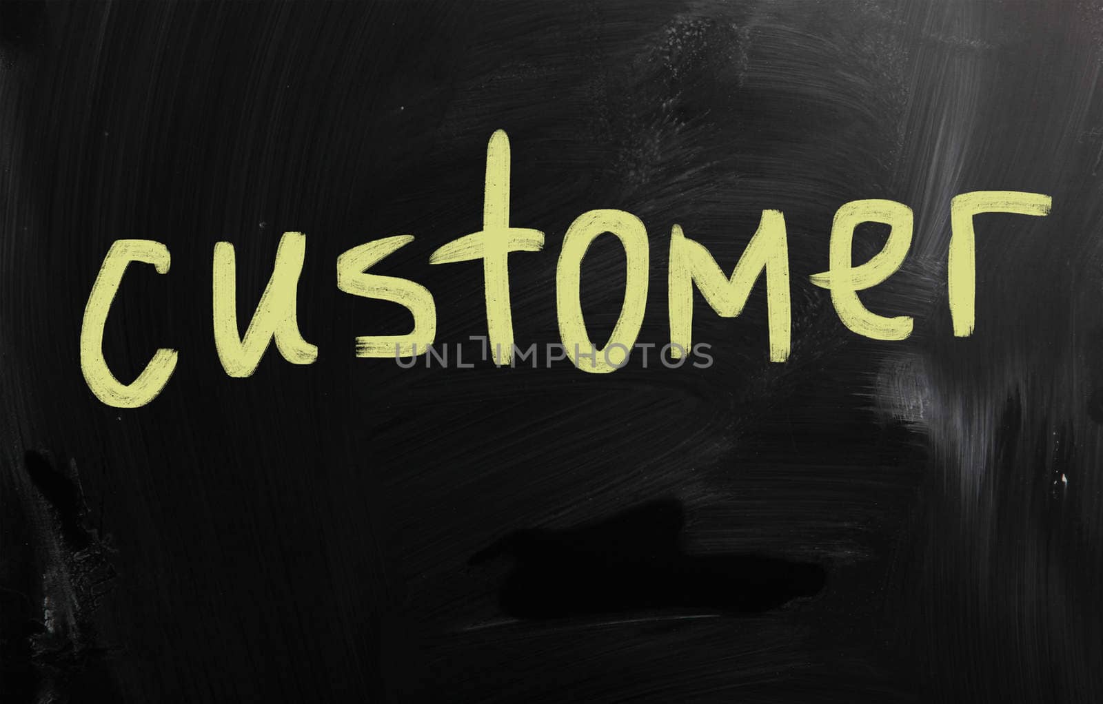 "customer" handwritten with white chalk on a blackboard