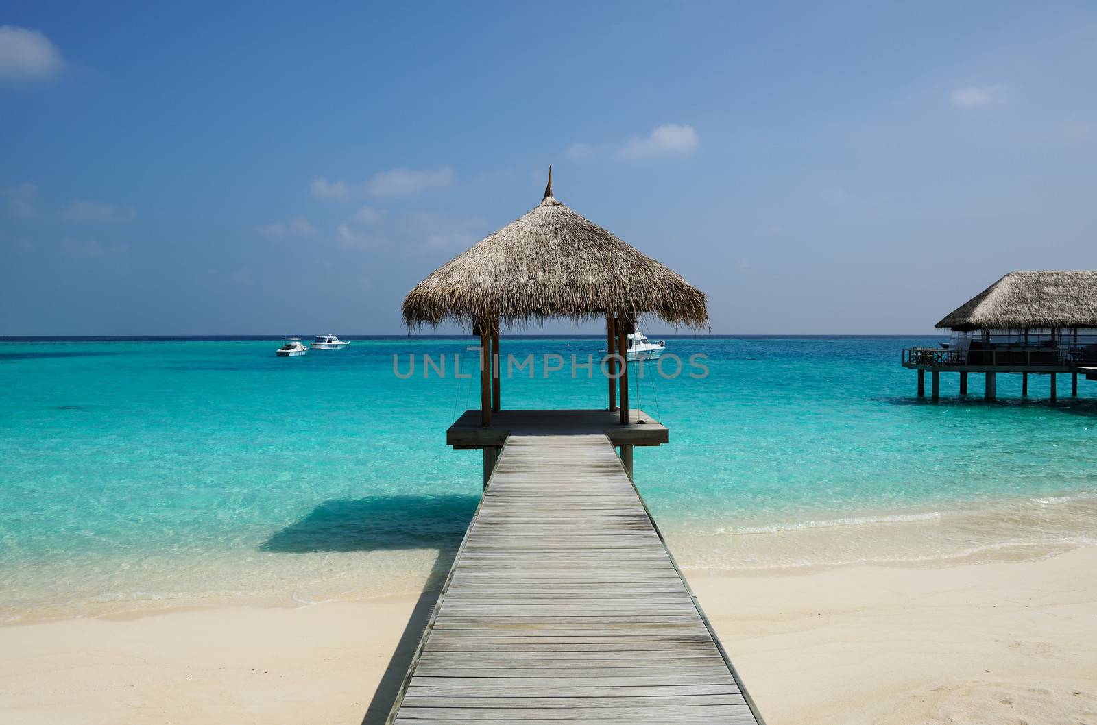 Beautiful beach with jetty at Maldives