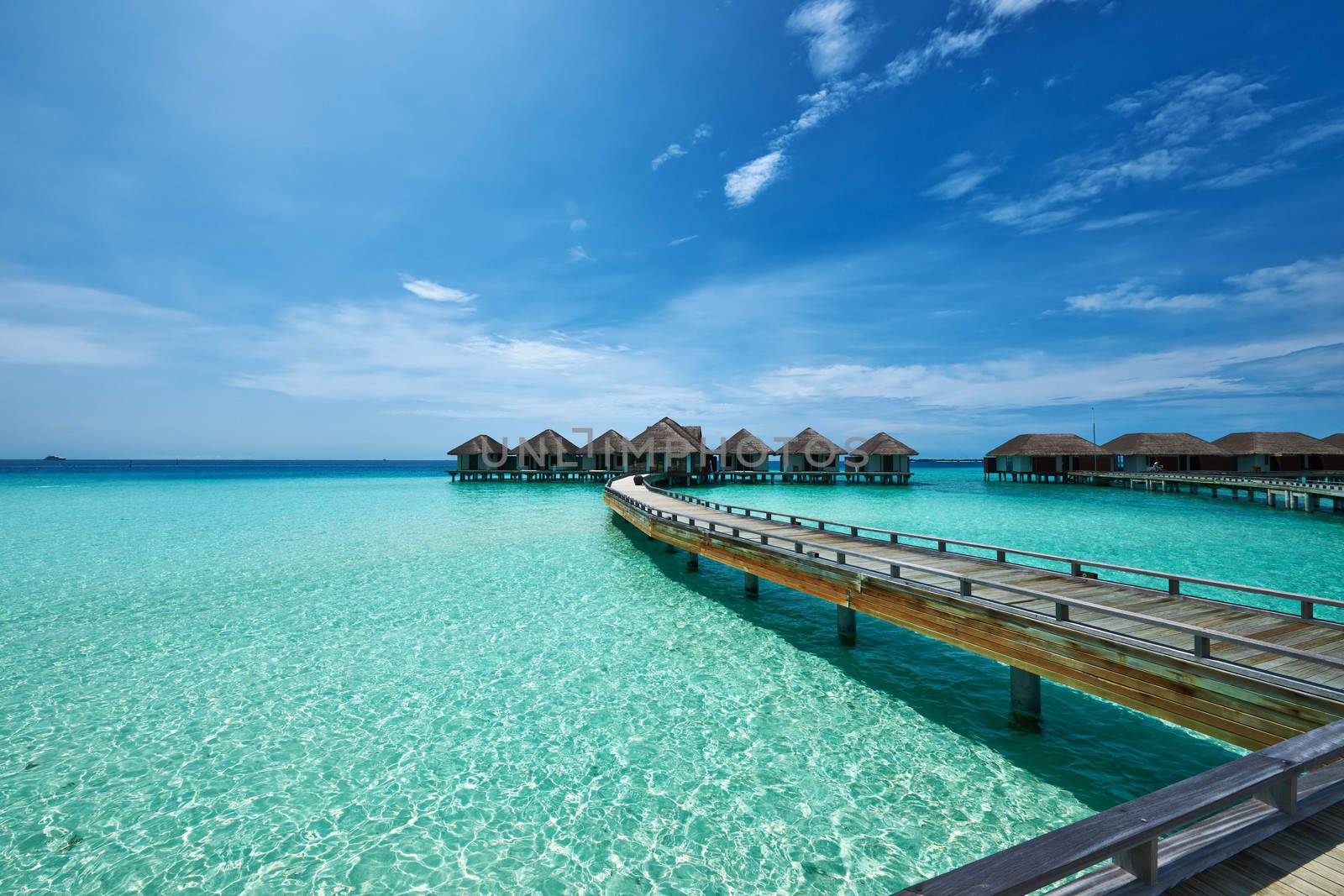 Beautiful beach with water bungalows at Maldives