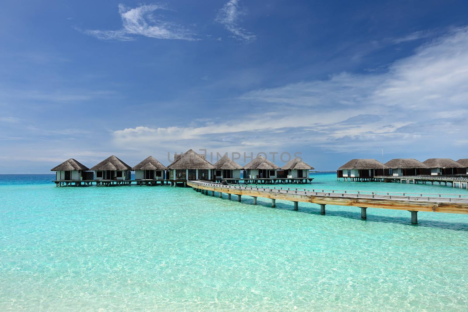 Beautiful beach with water bungalows at Maldives