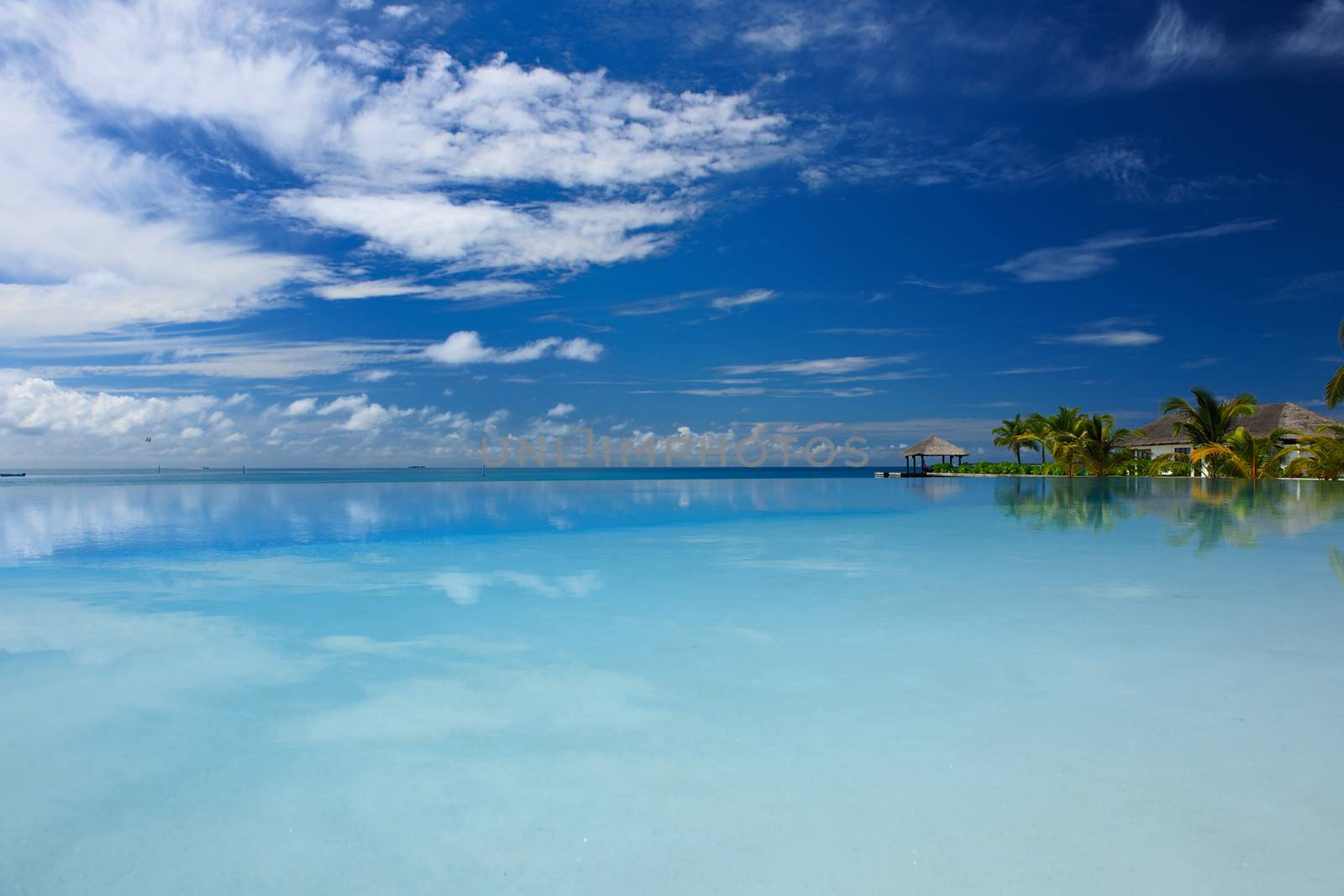 Luxury swimming pool in the tropical hotel