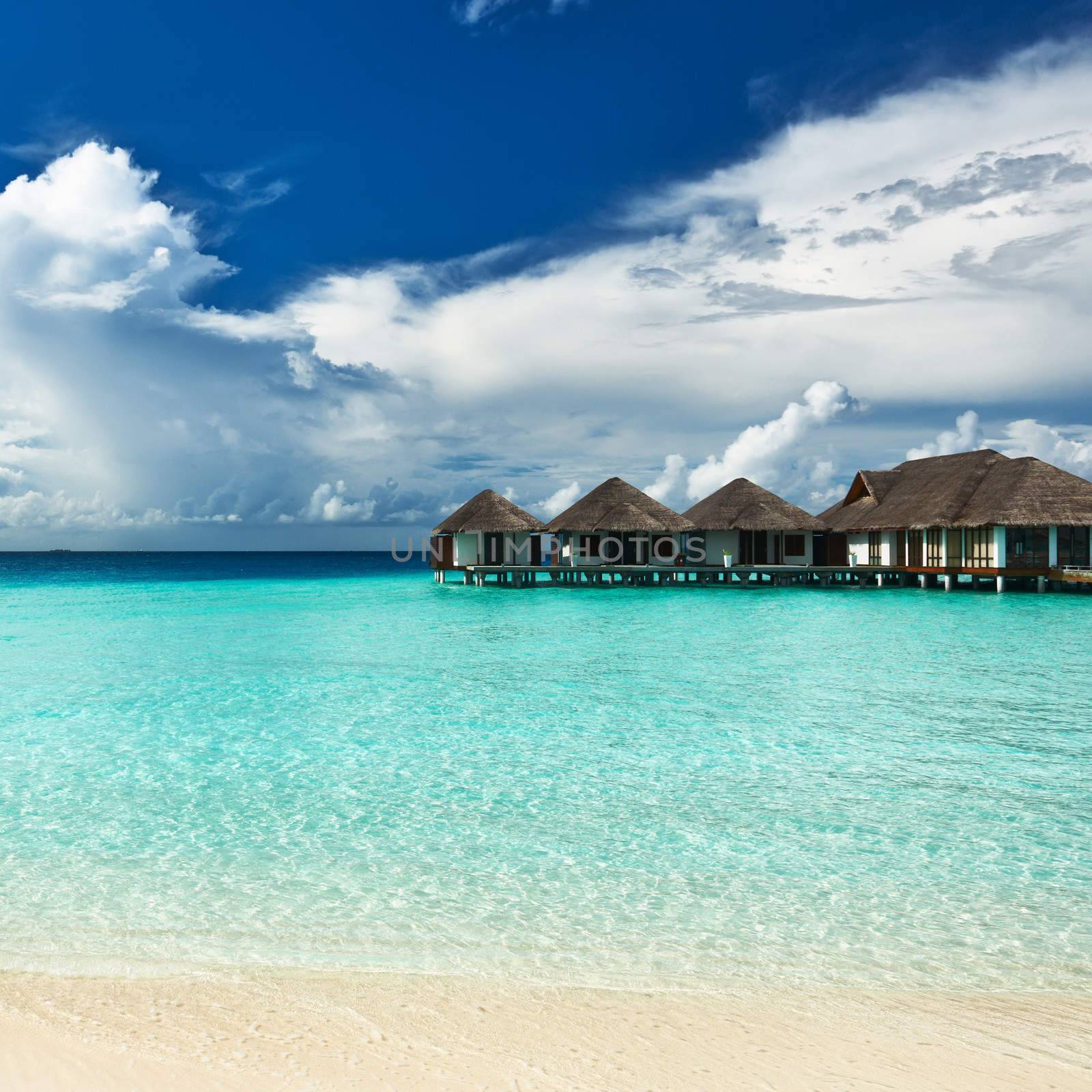 Beautiful beach with water bungalows at Maldives