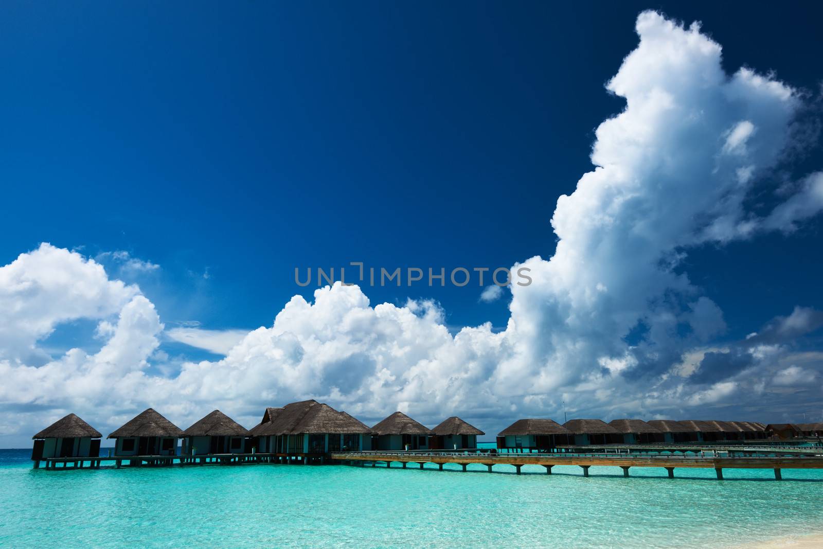 Beautiful beach with water bungalows at Maldives