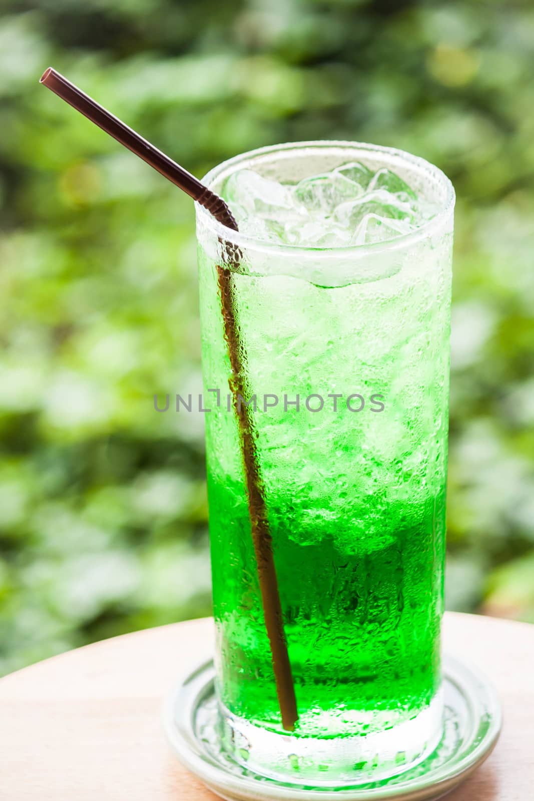 Fresh sweet green drink with ice cubes by punsayaporn