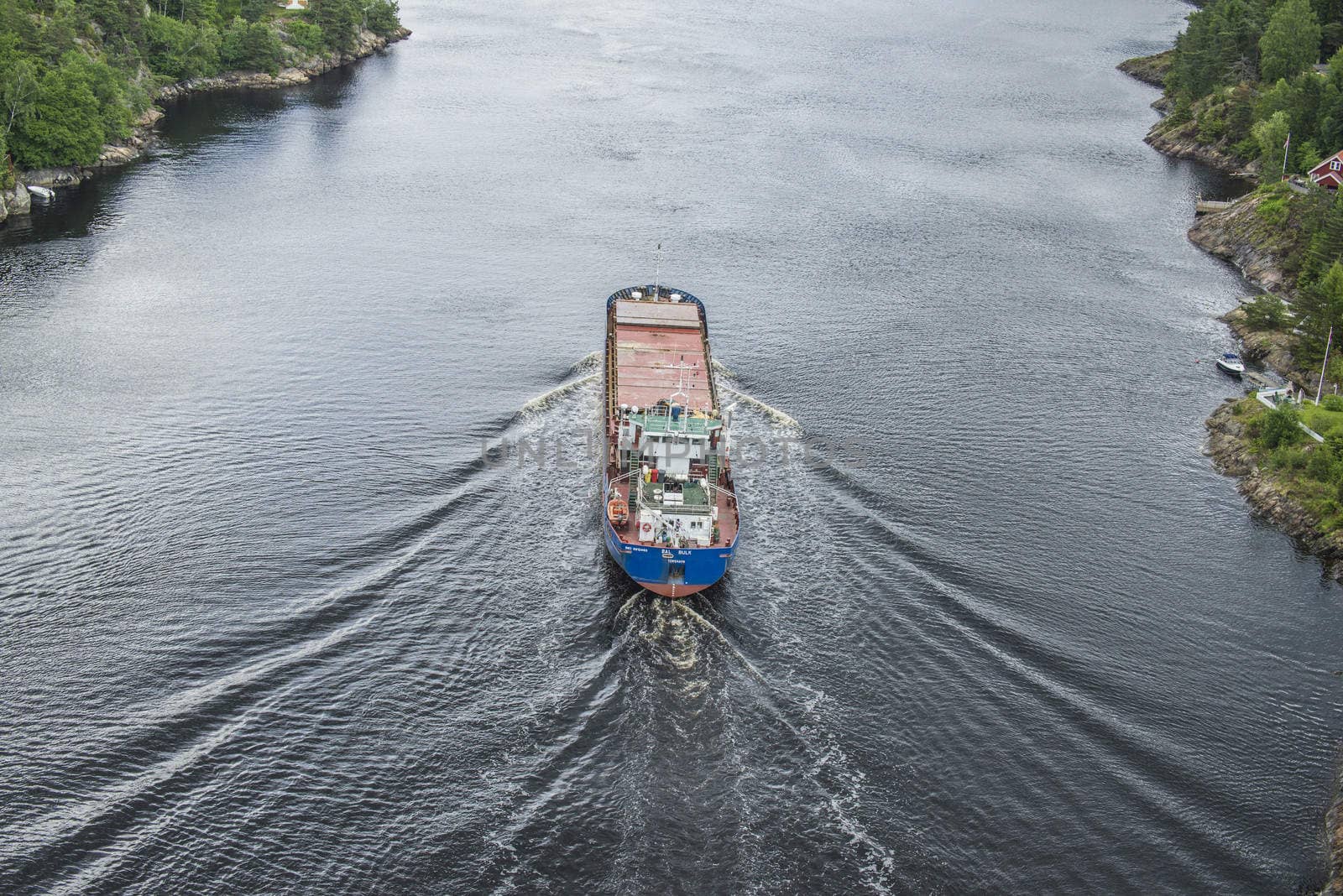 Cargo vessels Bal Bulk going to the port of Halden, Norway in order to unload gravel. The picture is shot from Svinesund Bridge