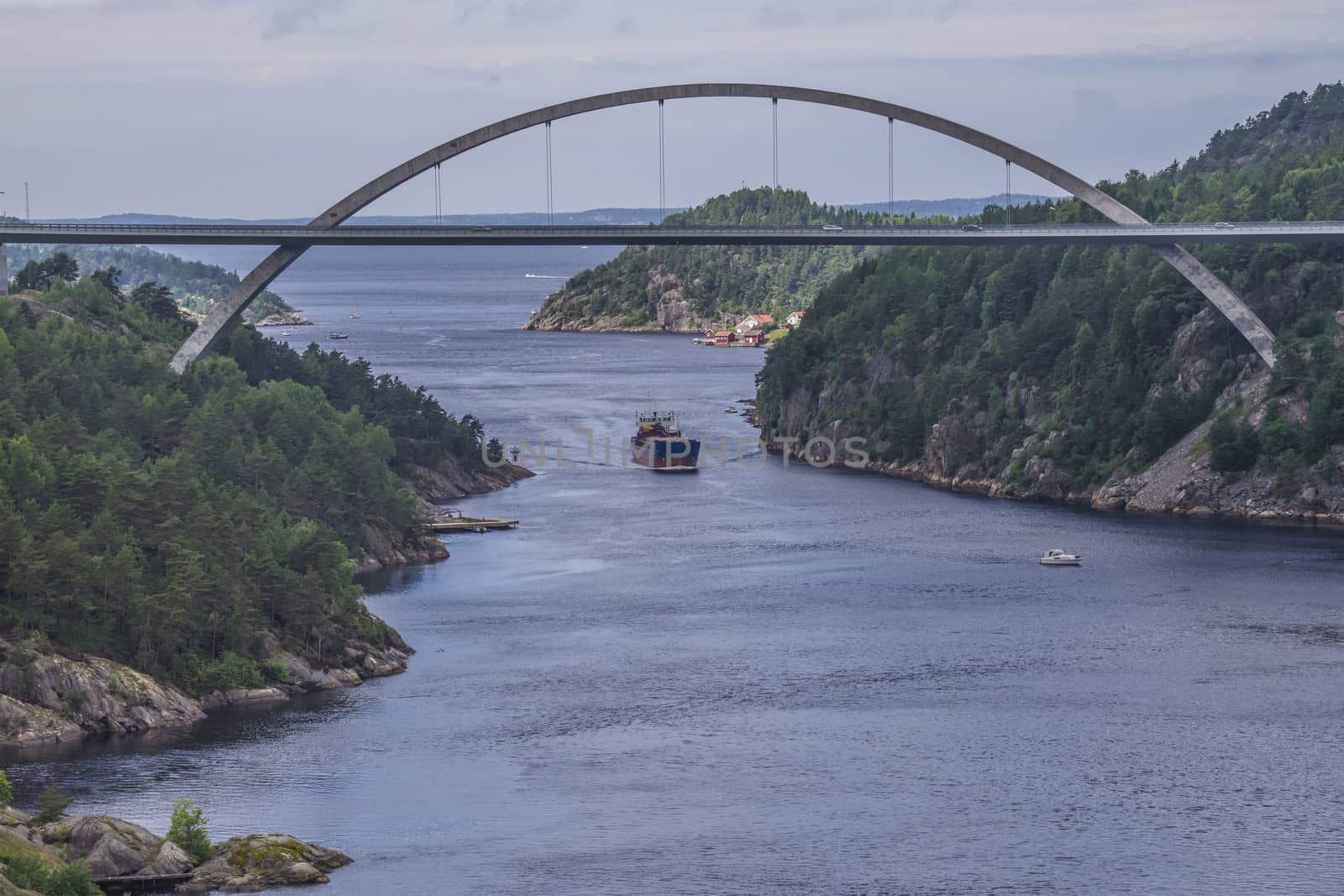 Cargo vessels Bal Bulk going to the port of Halden, Norway in order to unload gravel. The picture is shot from Svinesund Bridge