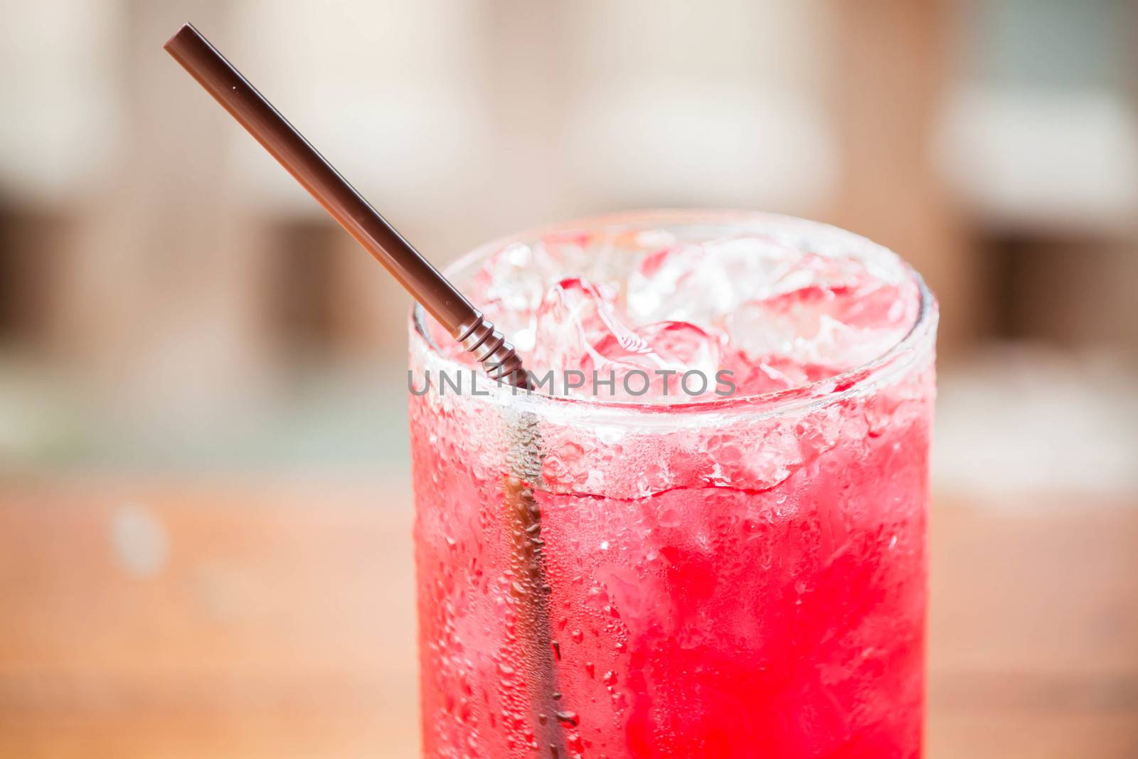 Close up ice cubes on red drink