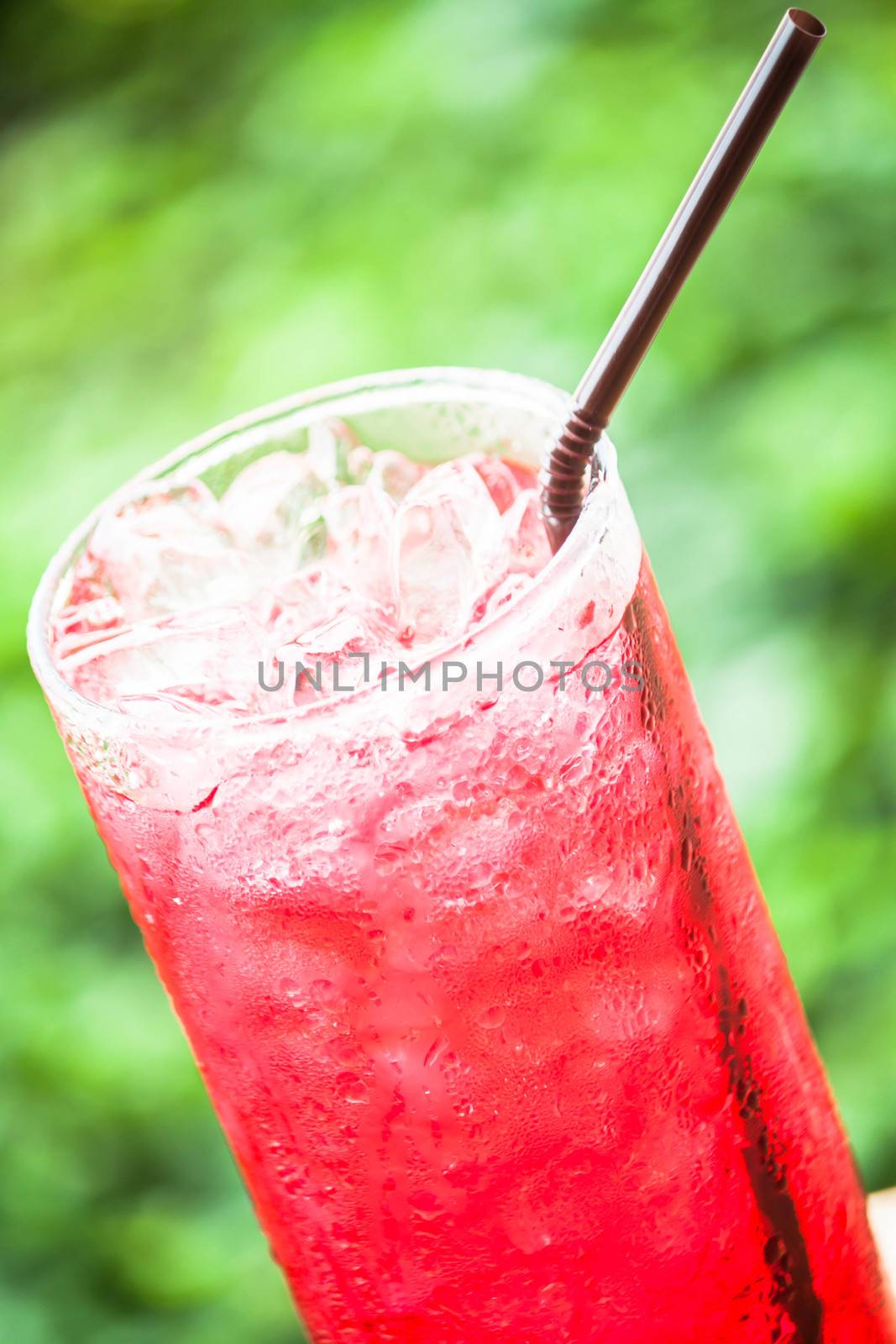 Refreshing glass of non alcohol cold red drink  by punsayaporn