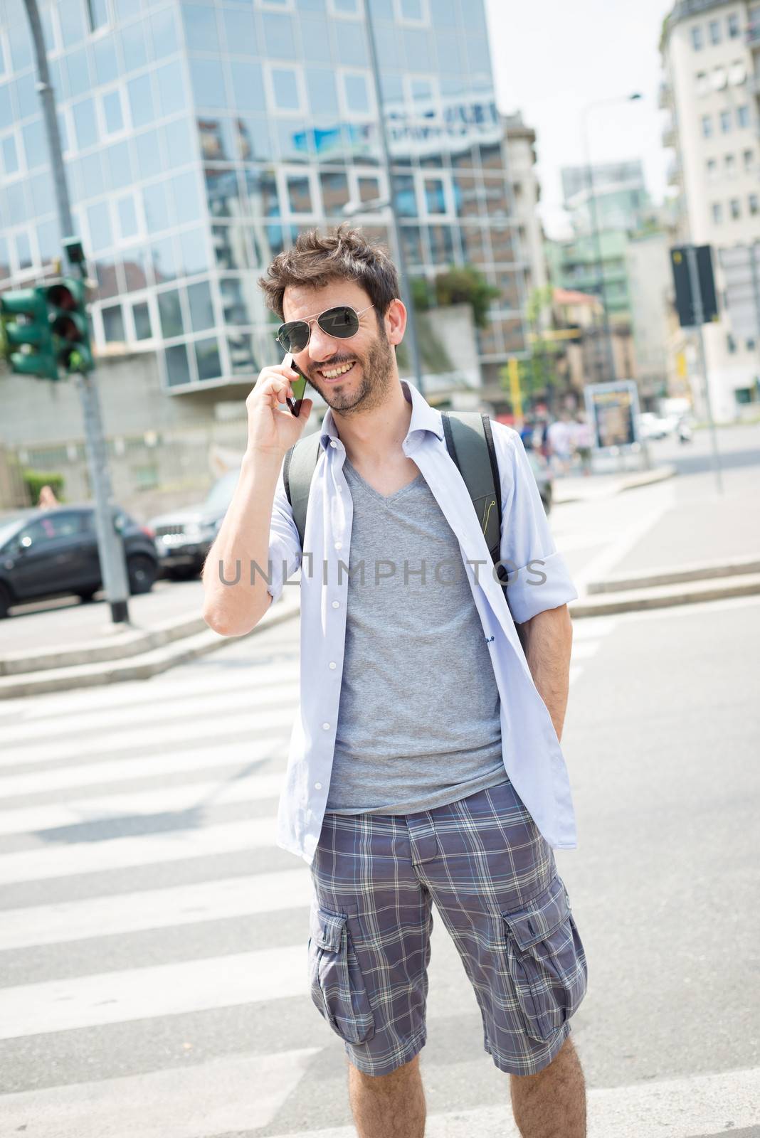 man in the street on the phone in the morning