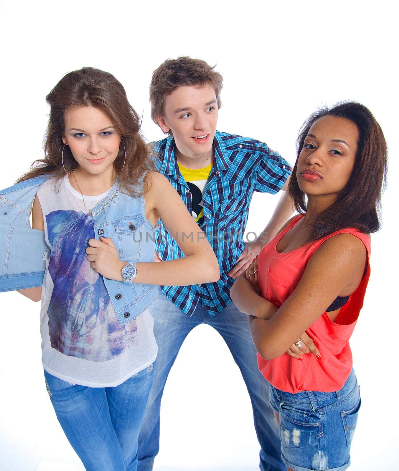 Portrait of three young teenagers grimacing. Isolated on white background.