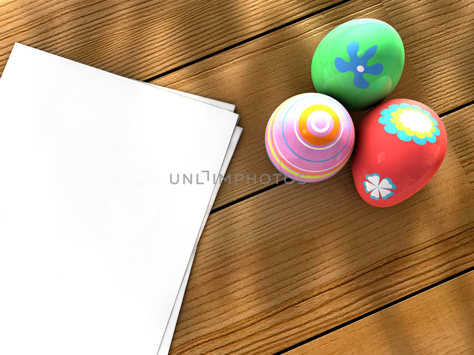 Colorful Easter eggs on a table next to notebook sheets
