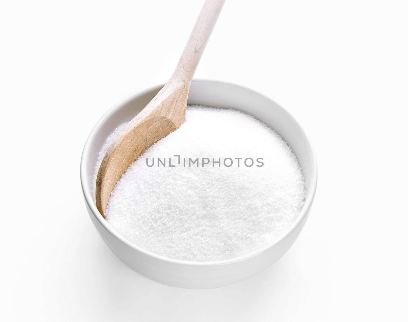 Wooden spoon with sugar by dynamicfoto