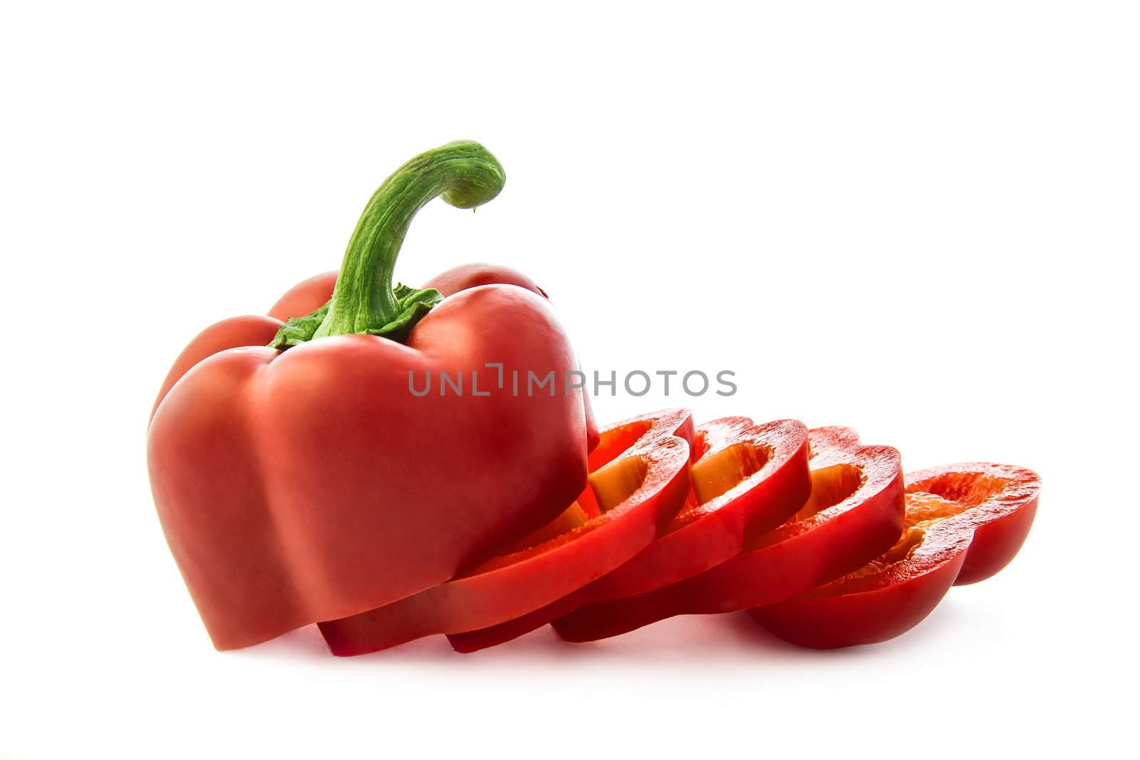 Red pepper sliced on white background