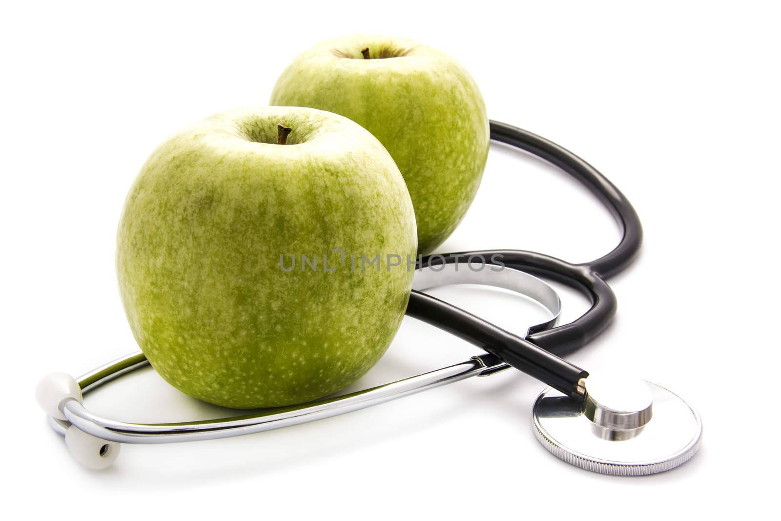 Apples and stethoscope background by dynamicfoto