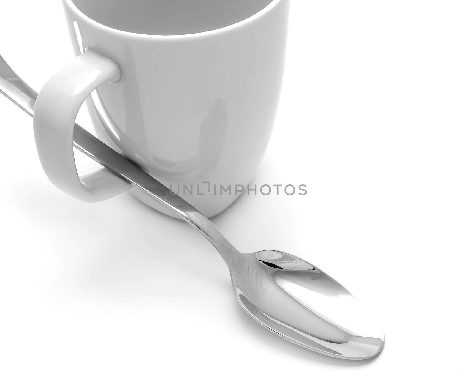 Mug and spoon by dynamicfoto