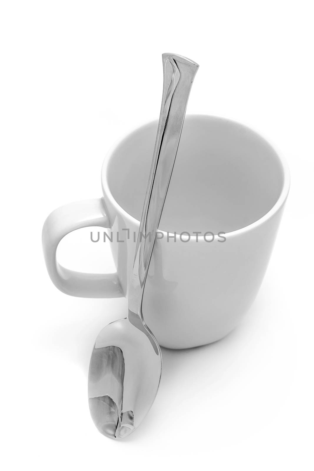 Mug and spoon by dynamicfoto