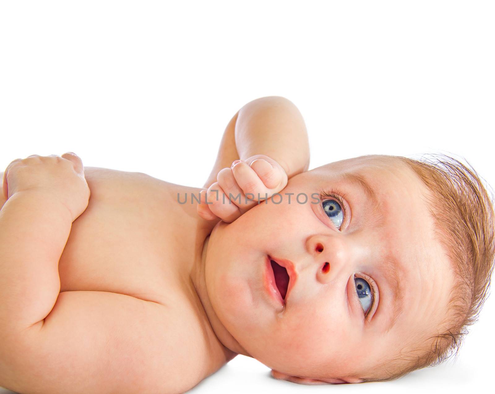Lovely baby looking up on white background
