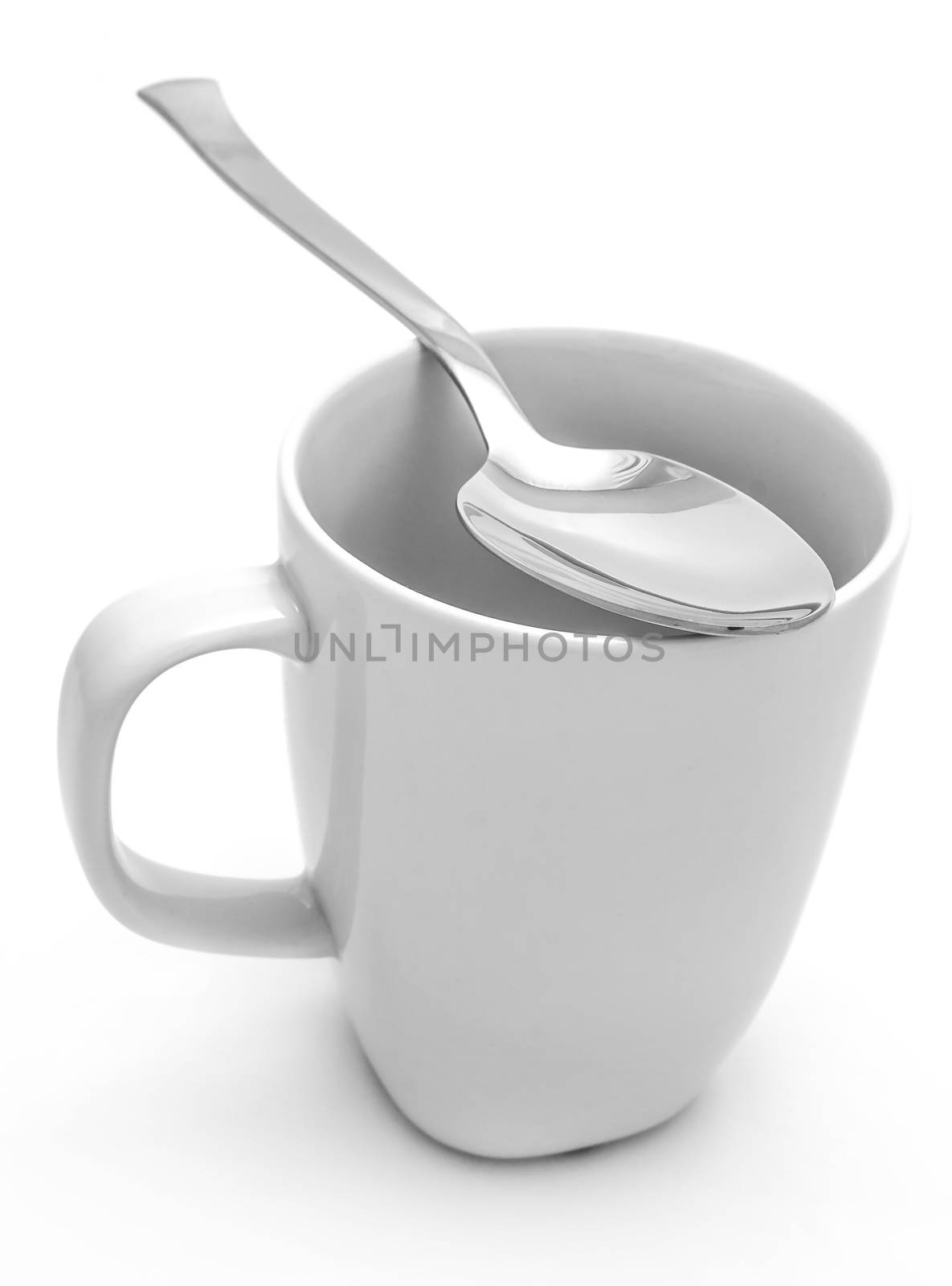 Mug and spoon by dynamicfoto