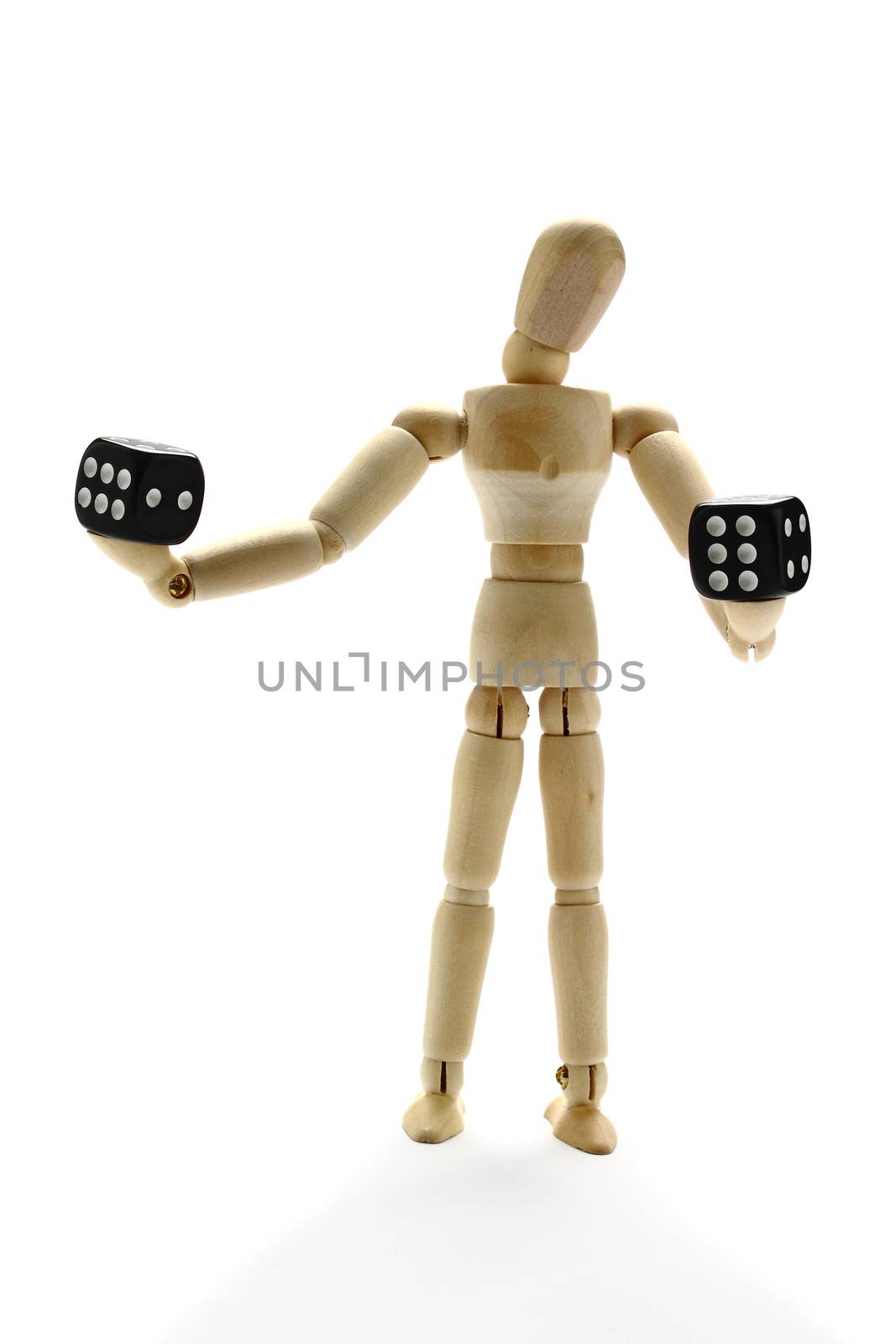 Wooden manikin choosing between two dice