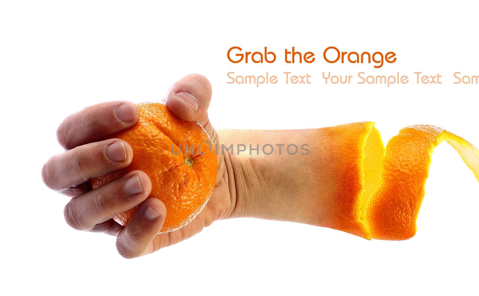 Hand grabbing an orange with place for personalized text