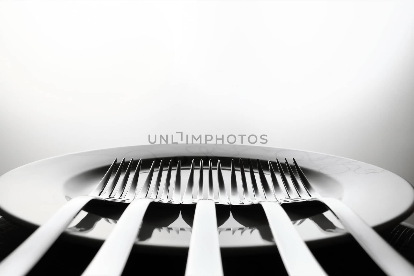 Dish and forks by dynamicfoto