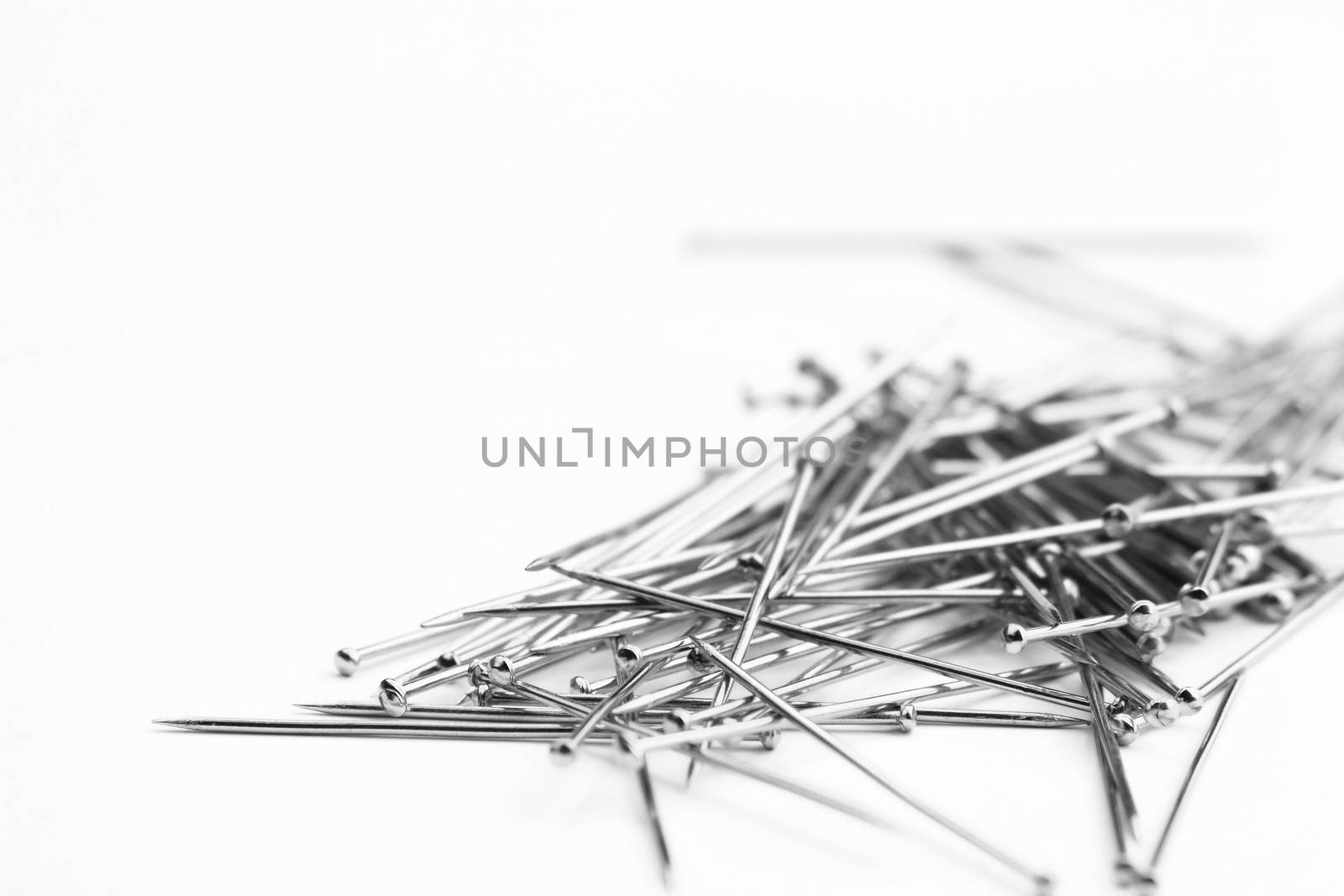 Pile of pins by dynamicfoto