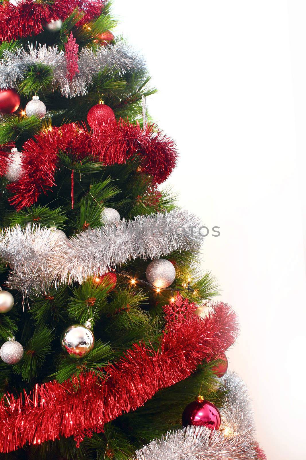 Christmas tree with decorative elements on white background