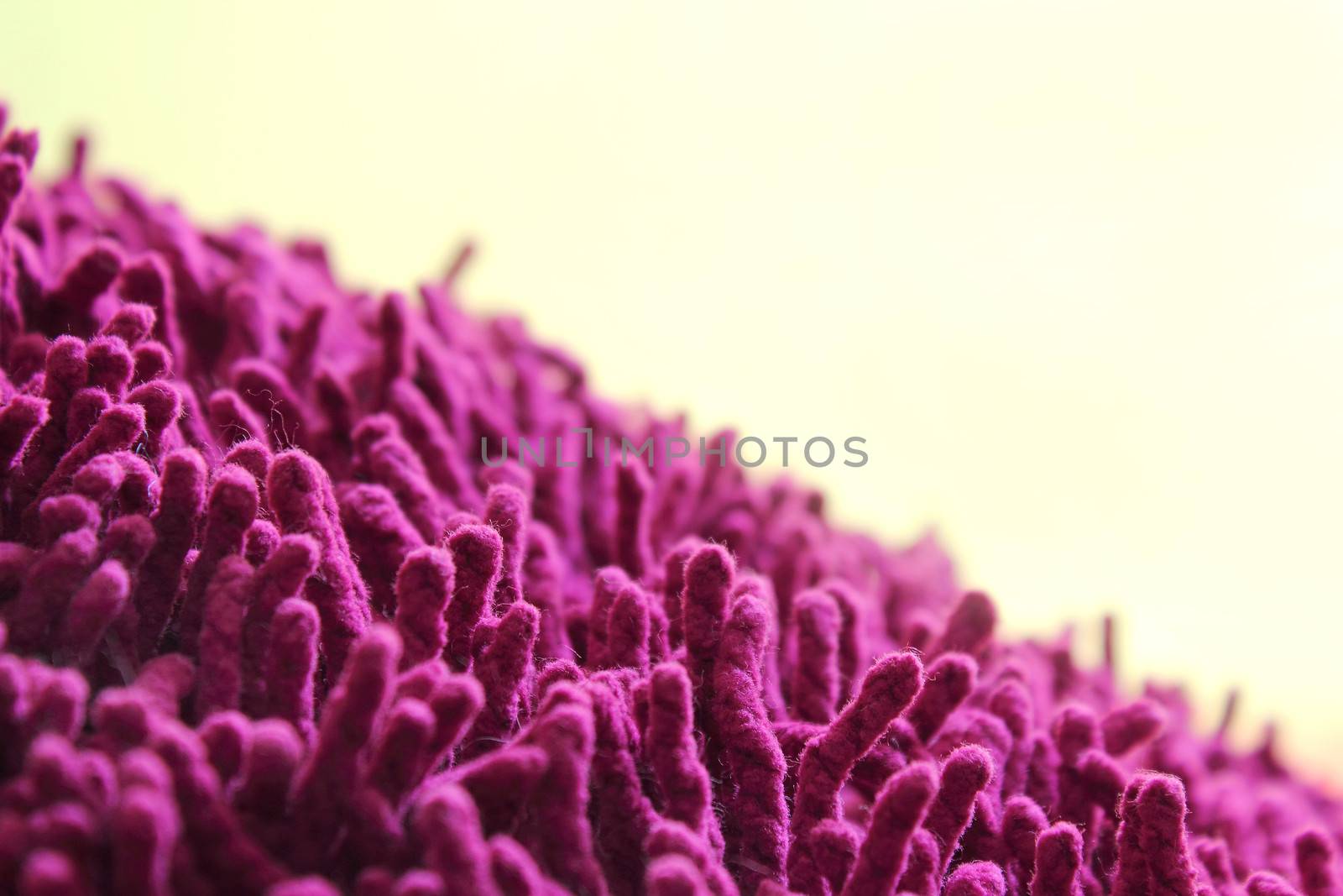 Purple cotton chenille background close-up