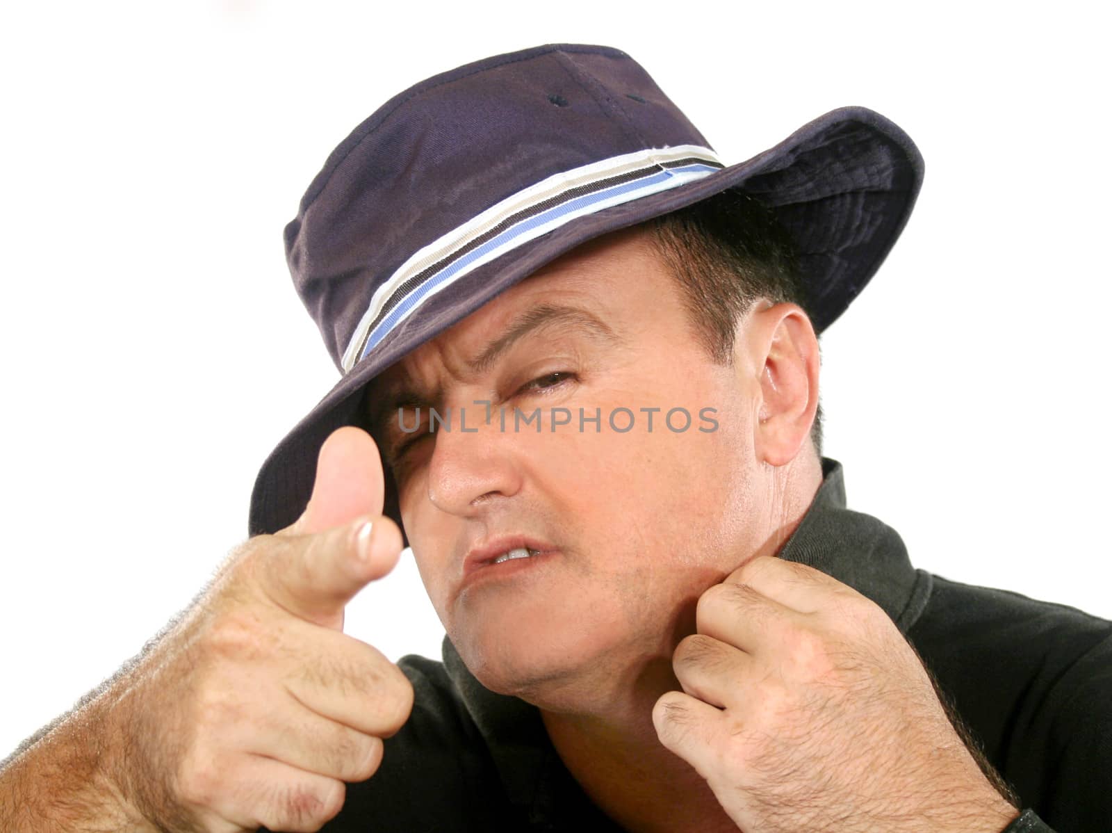 Confident man in hat looking at camera and pointing.