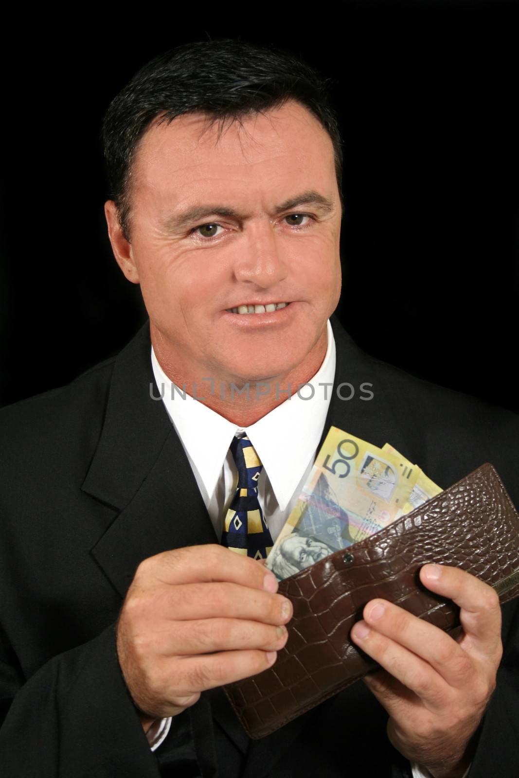 Smug salesman has made more money than he thought he had.