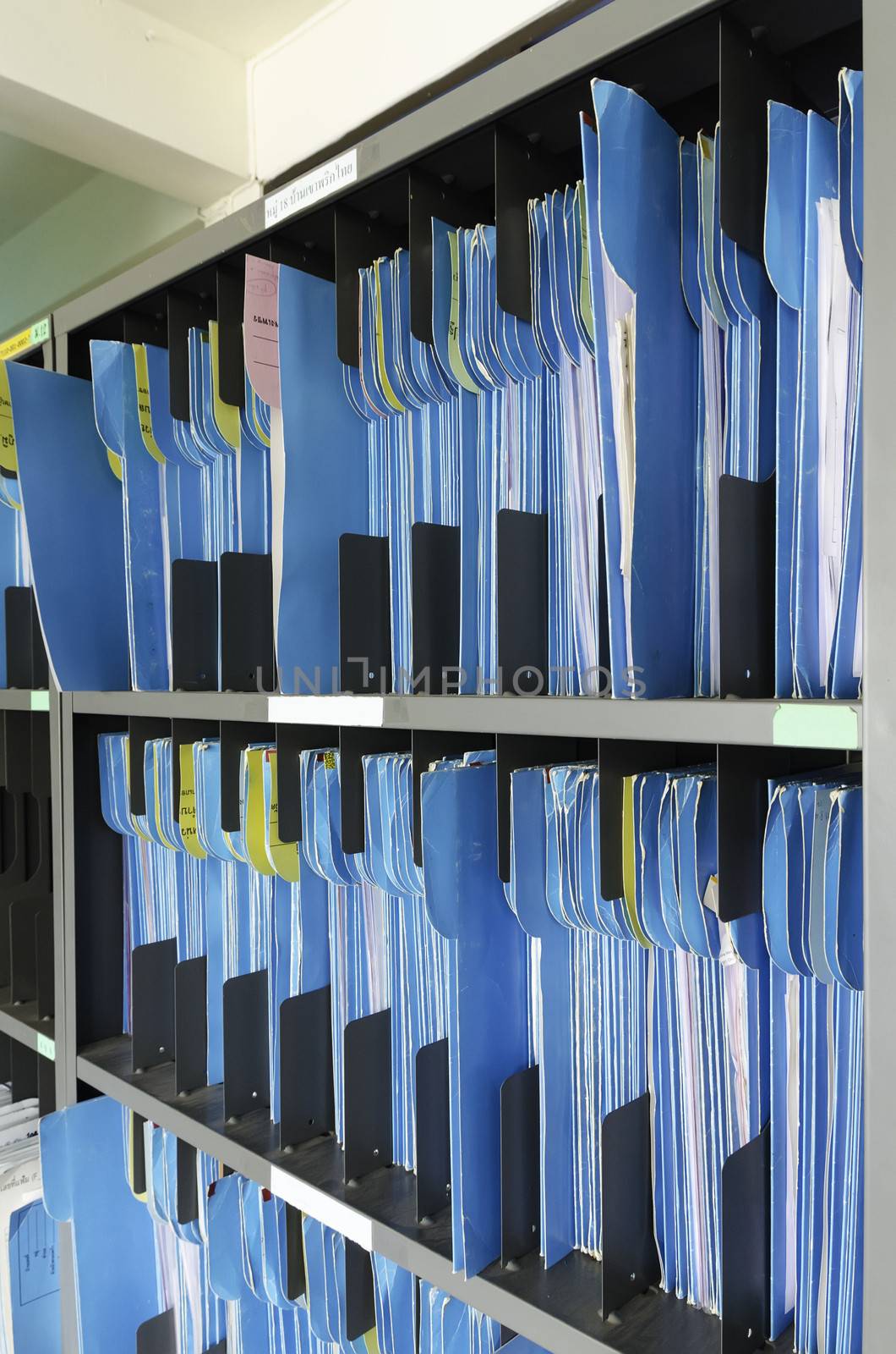 Shelf full of folders and files in an office