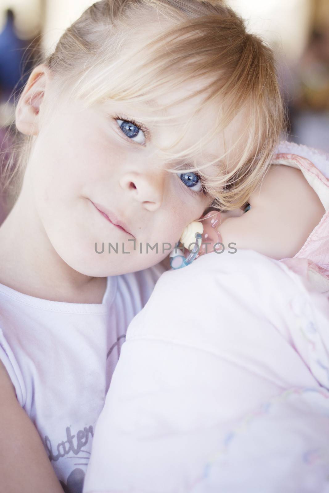 Child with doll by annems