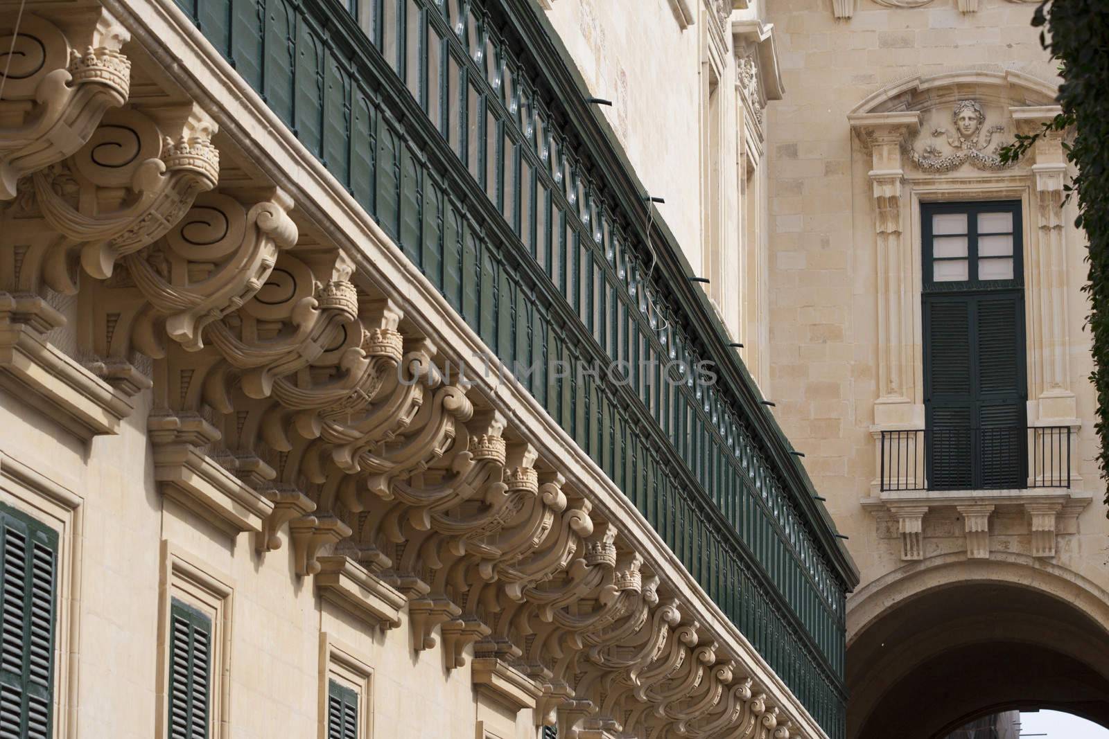 Traditional wooden balcony on an old palace in Valletta, Europe, which used to house the Grandmaster of the Order of St John, the temple knights