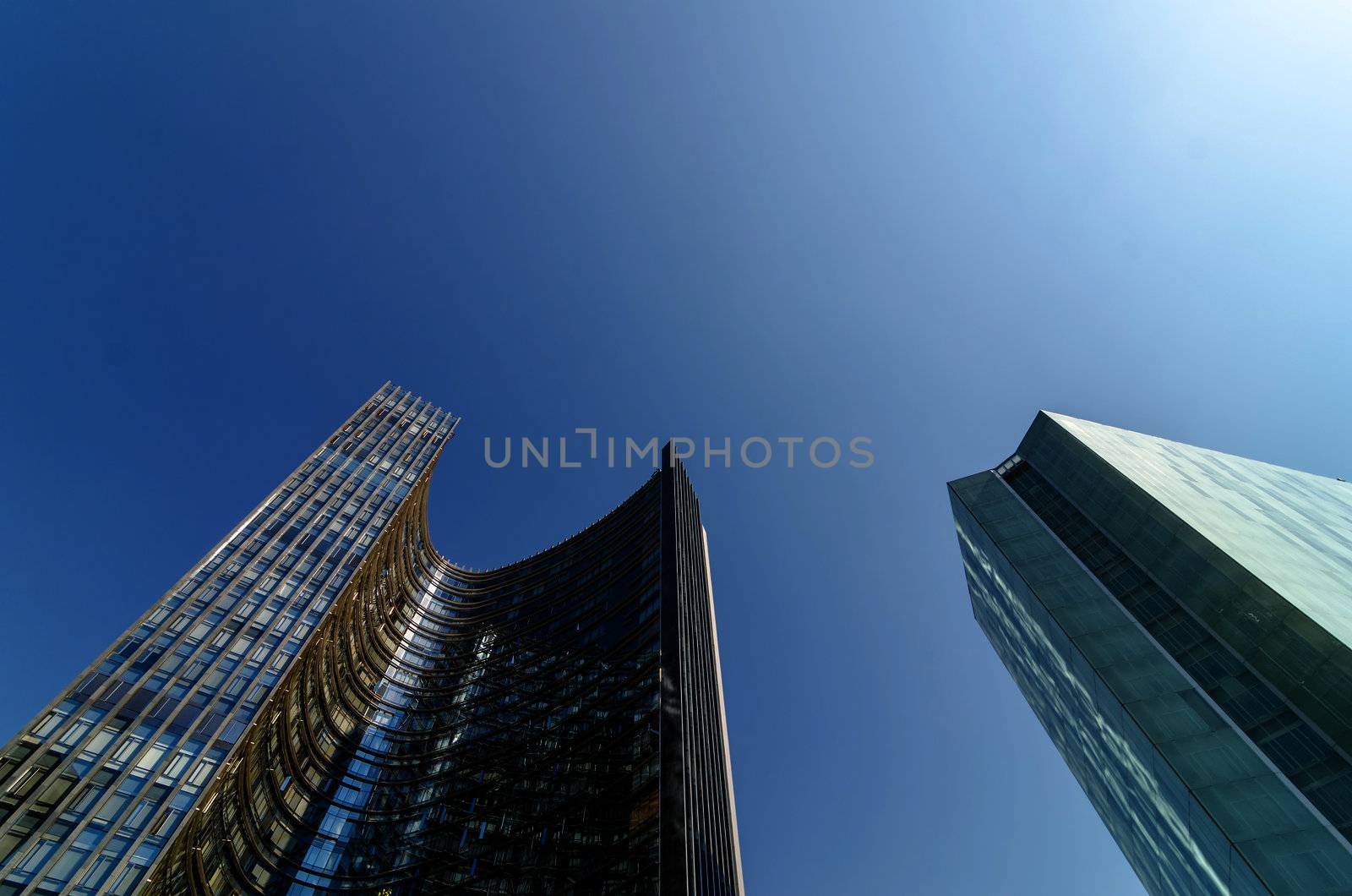 Shiny skyscrapers and a beautiful blue sky