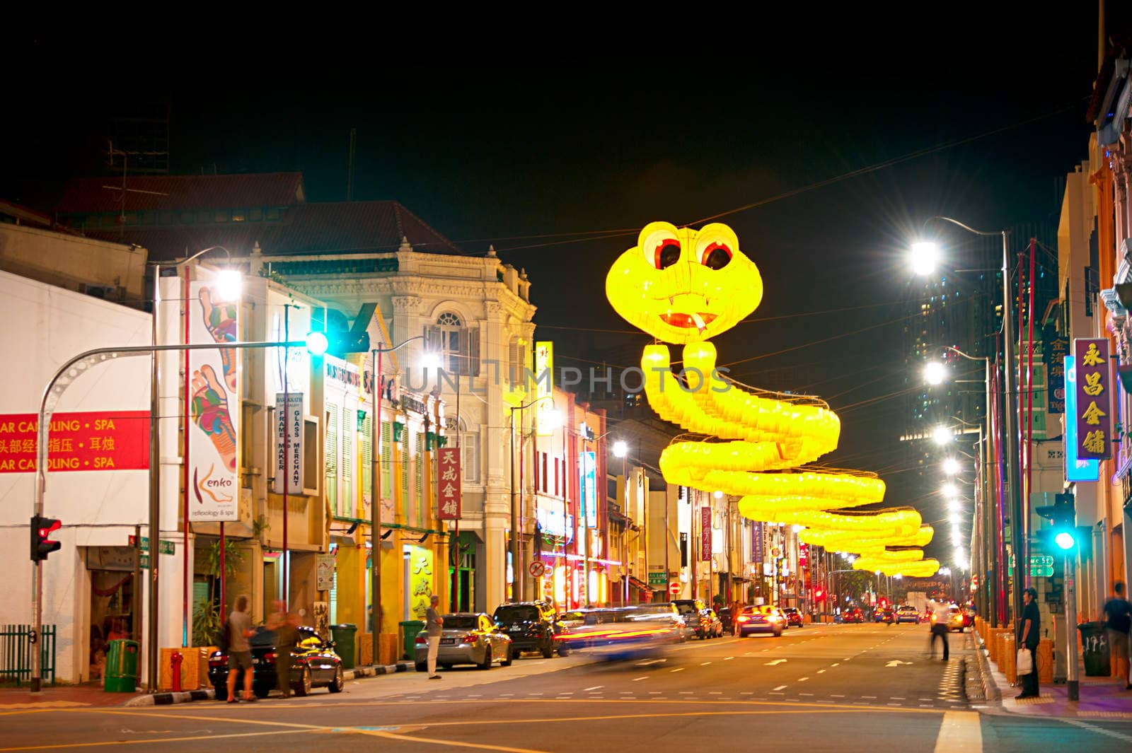 Singapore, Republic of Singapore - March 07,2013: Chinatown street at night in Singapore. The city state's ethnic Chinese began settling in Chinatown circa 1820s.