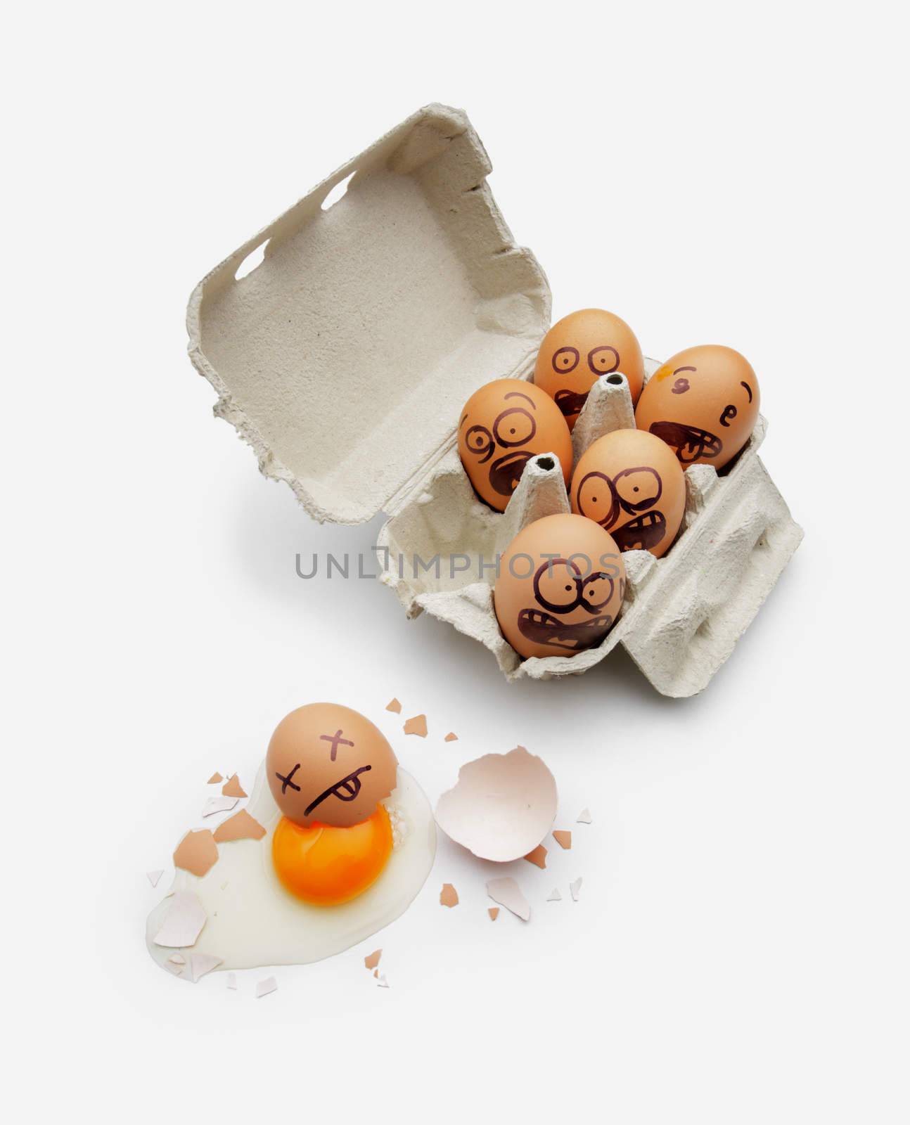 Eggs in a box are scared of dead friend by stokkete