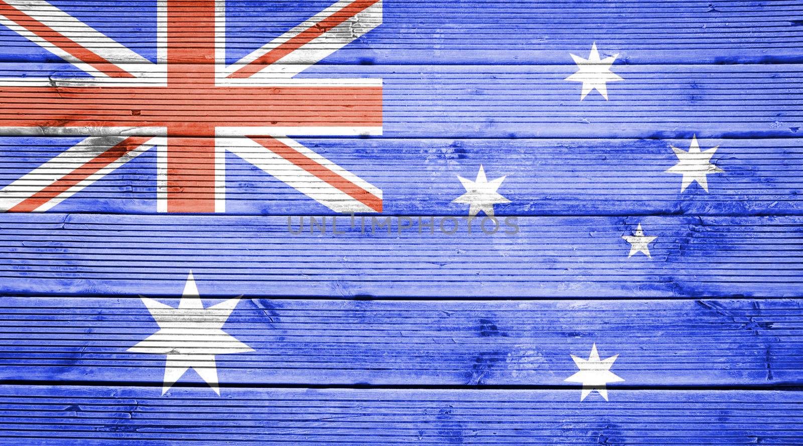 Natural wood planks texture background with the colors of the flag of Australia