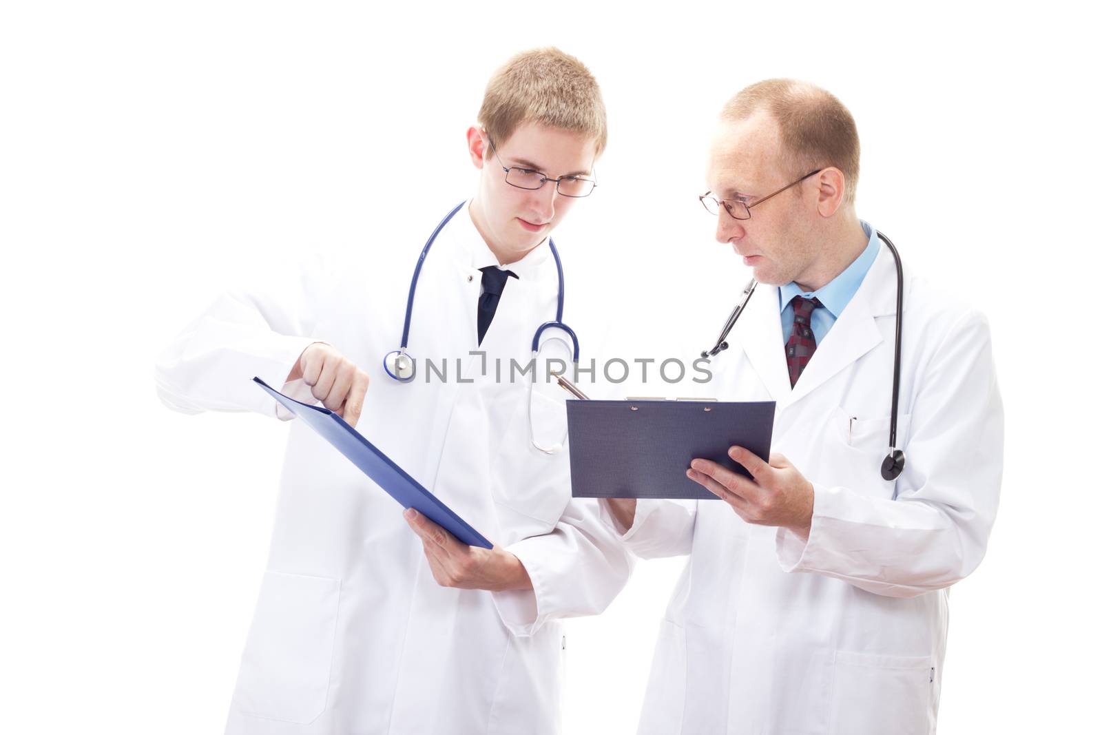 Team of male doctors comparing their documents