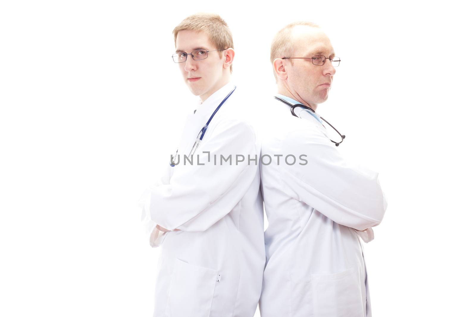 Two male doctors standing back-to-back