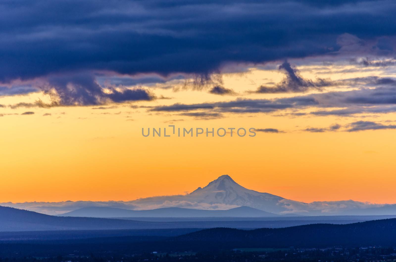 Orange sky over Mt. Hood seen during sunset from Bend, Oregon