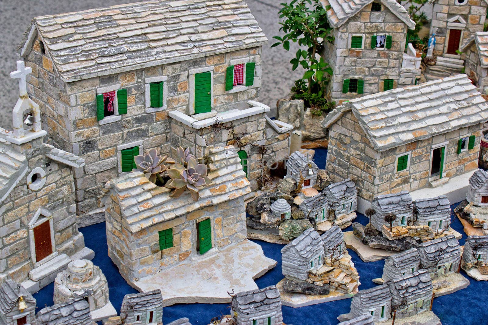 Mediterranean style stone village model, stone houses and church