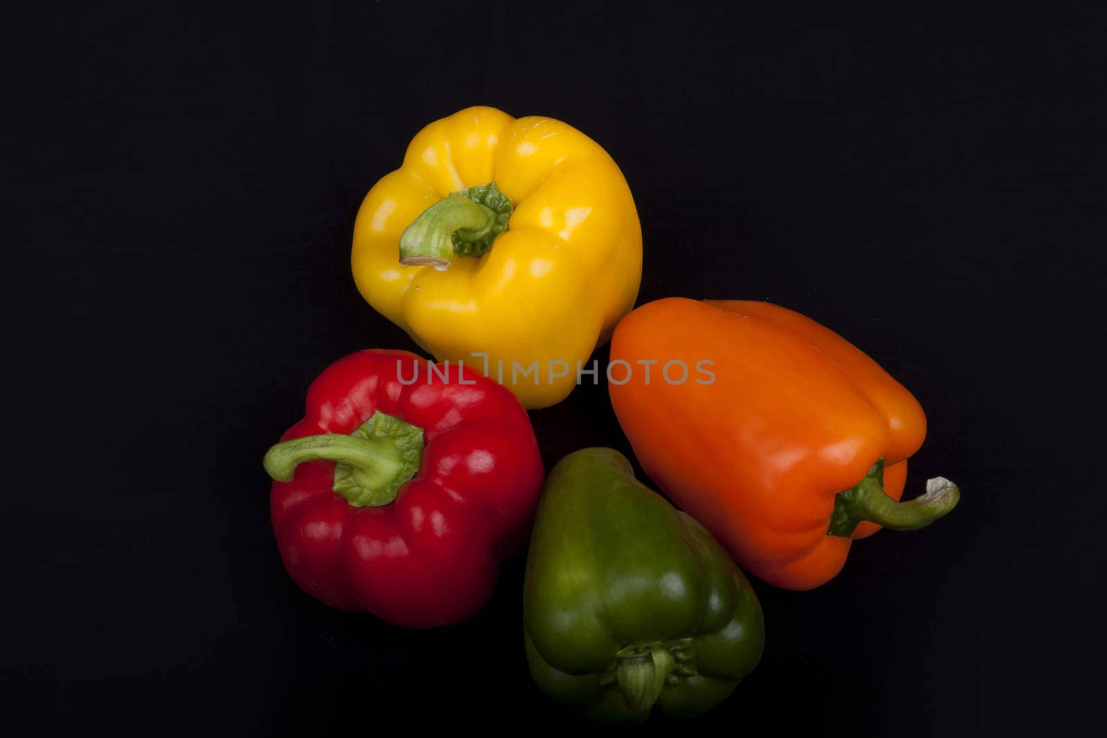 Multi-Colors peppers isolated on a black background