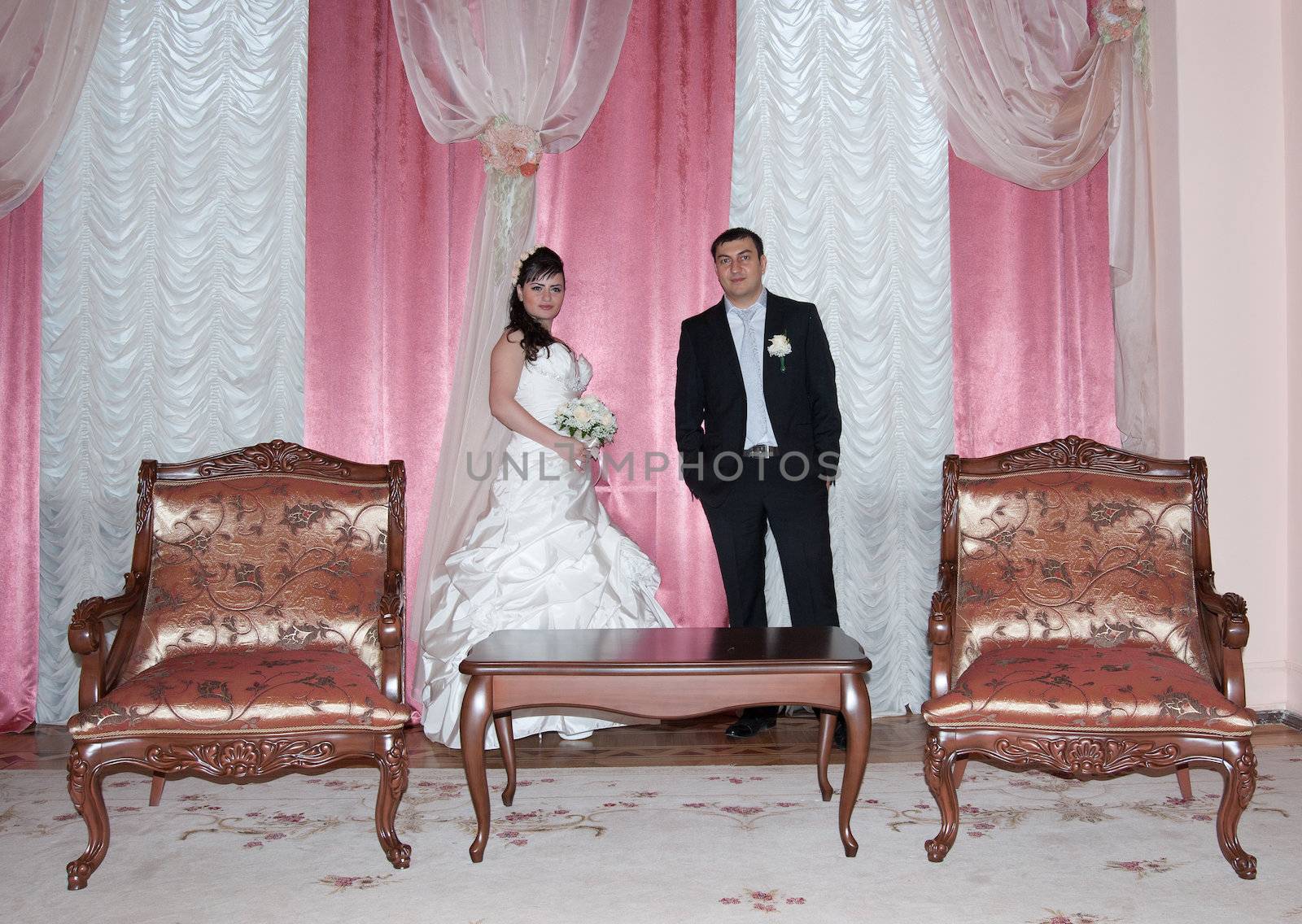 bride and groom in the living room