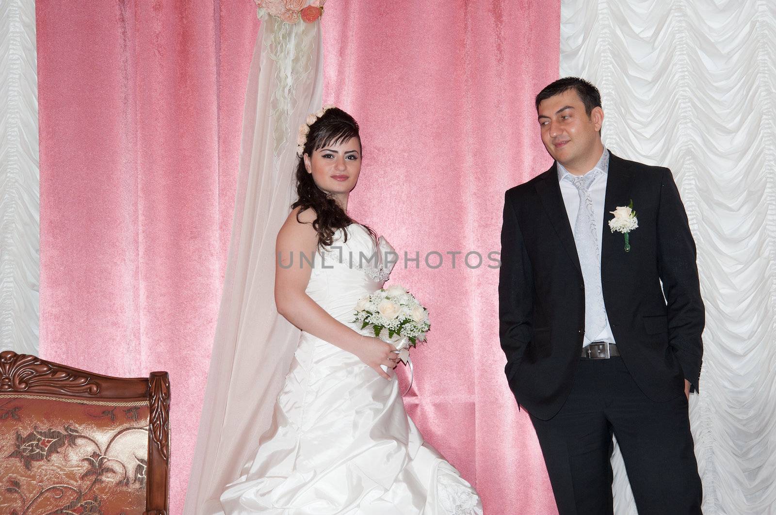bride and groom in the living room