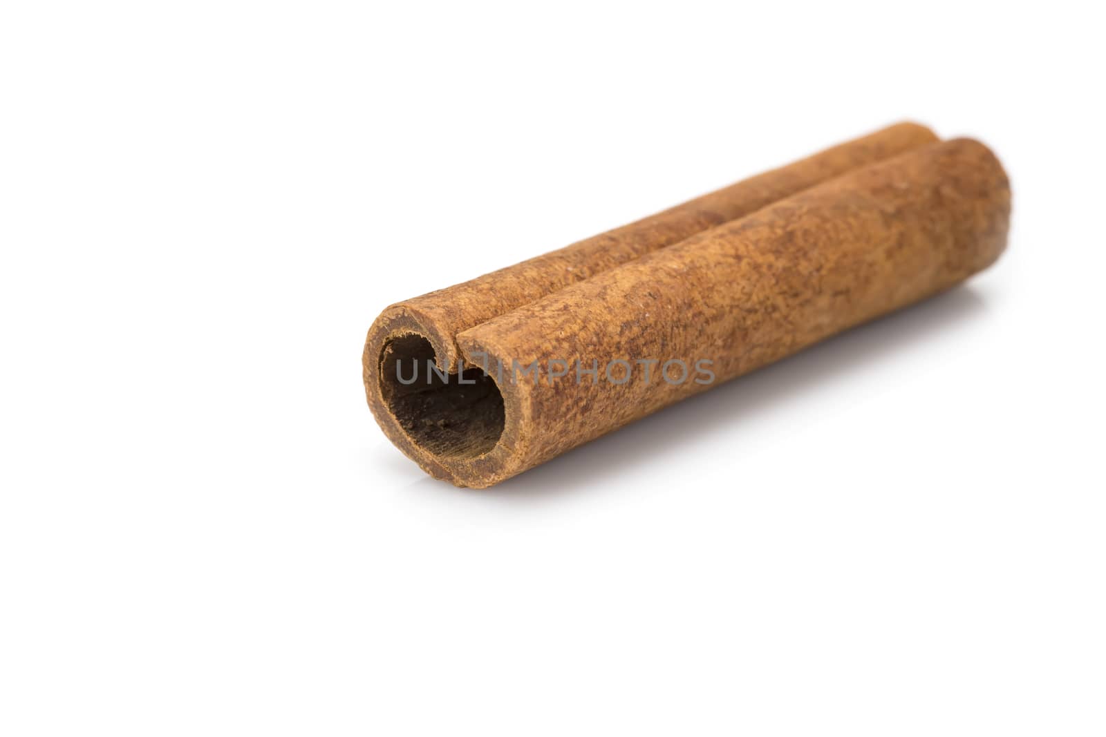 Cinnamon stick isolated over a white background